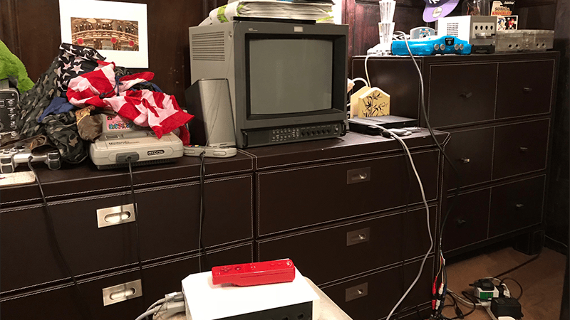 Sony PVM CRT on drawers with Super Famicom, Wii and red Wii Remote