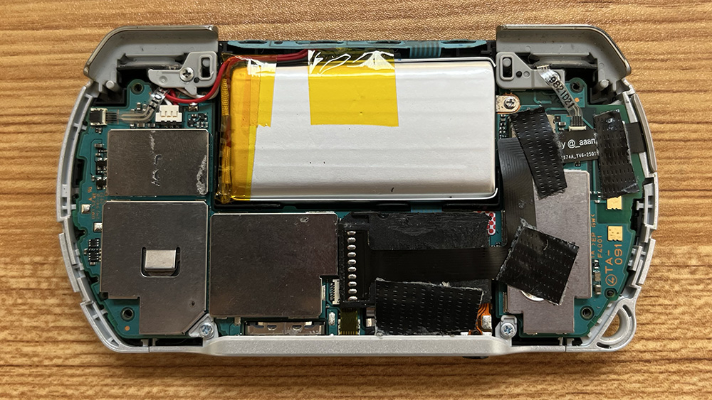 PSP Go with SD card adapter and battery replacement